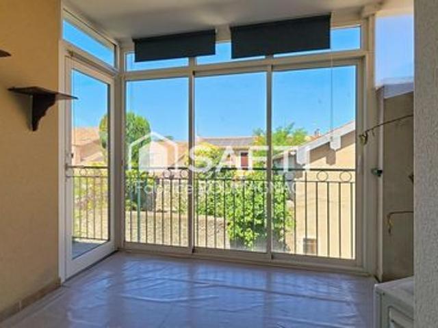Appartement de 60 m² avec terrasse, deux places de parking couverte et cellier