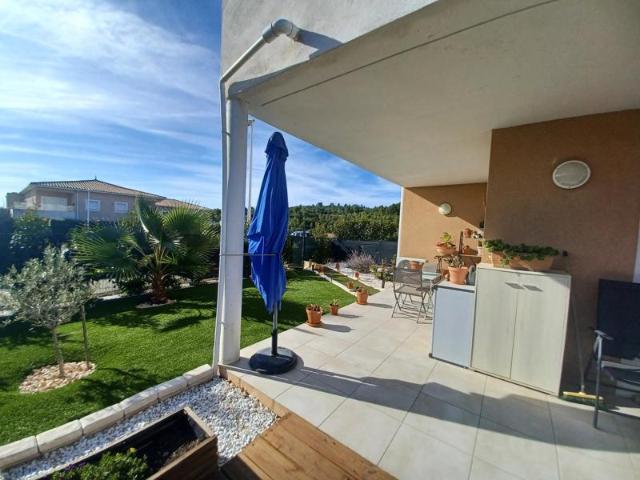 Appartement de 64m2 2 chambres jardin parking