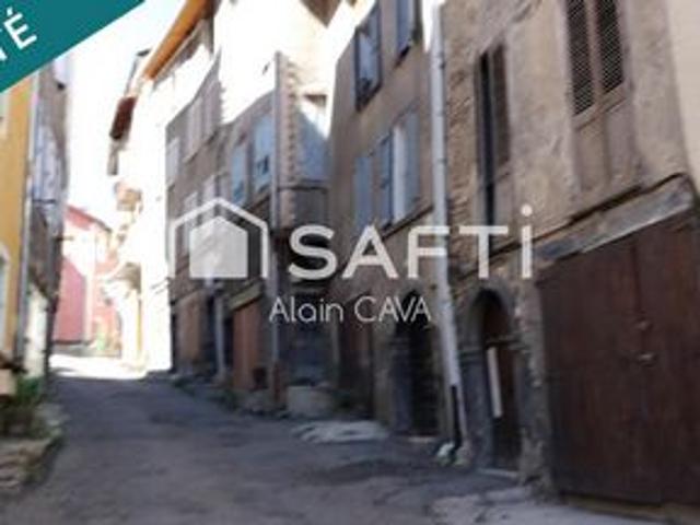 Appartement de 73m² tranversant avec terrasse, local commercial, grenier