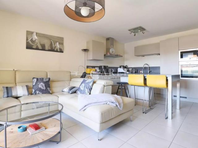 Appartement de 85 m² avec balcon au centre d'Azieu