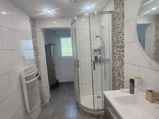 Appartement de 2 pièces avec garage, jardin et terrasse à