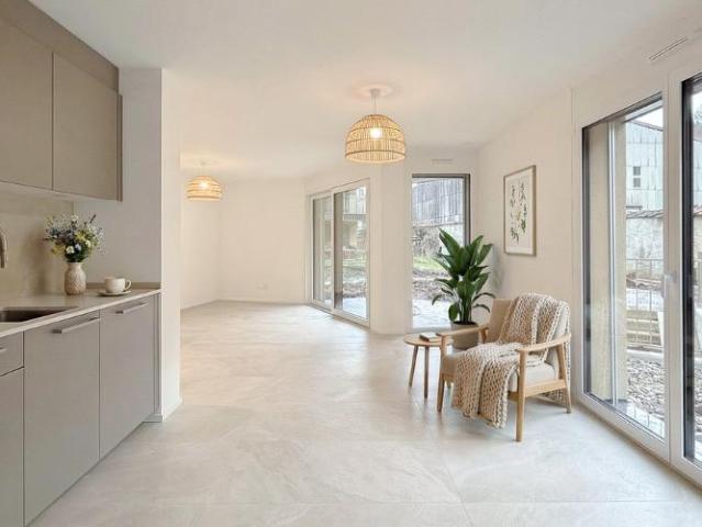 Appartement de 2.5 pces avec terrasse et jardin Logement neuf
