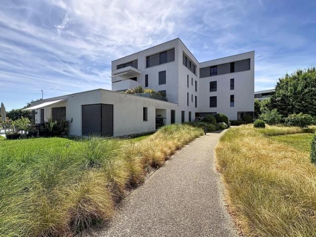 Appartement de 2.5 pièces avec véranda et jardin privatif à Saint Sulpice Comptoir Immobilier