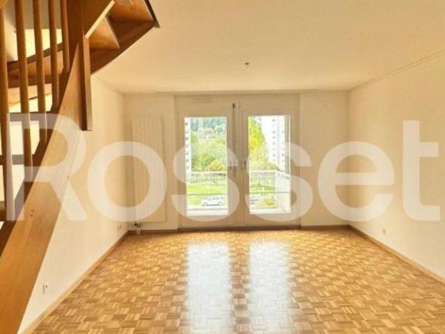 Appartement de 3 pièces au 1er étage en duplex de 80 m2 avec un balcon et une terrasse