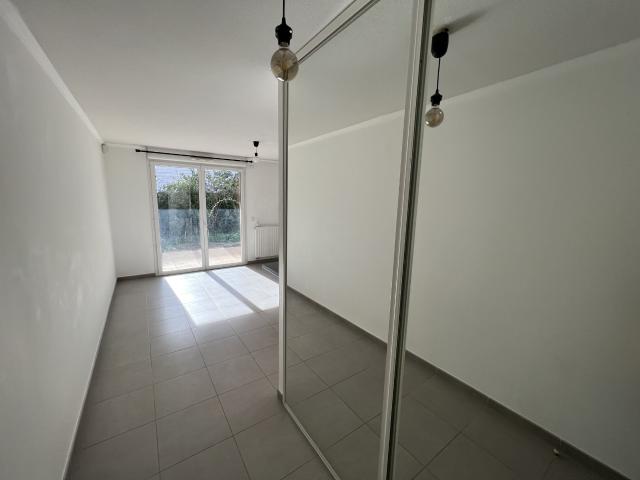 Appartement de type 2 avec terrasse et deux places de parking au sous sol