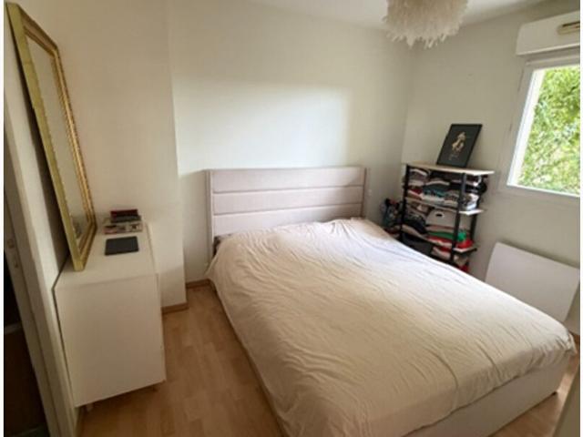 Appartement de type 2 avec jardin et place de parking