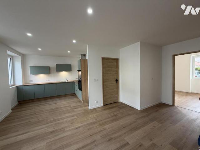 Appartement de type 3 au rdc surélevé
