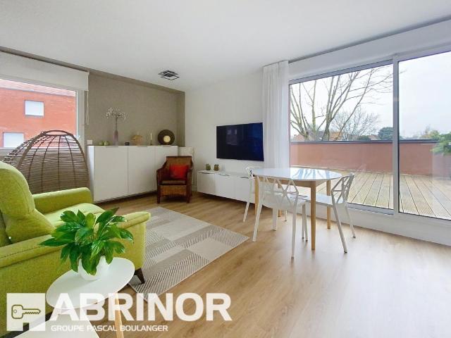 Appartement de Type 3 avec grande terrasse et place de parking en sous sol