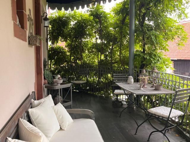 Appartement de caractère avec terrasse et opportunité foncière