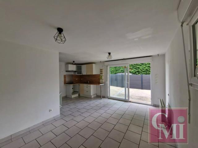 Appartement de plain pied avec jardinet privatif !