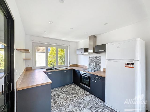 Appartement de standing avec jardin privatif, garage et parkings