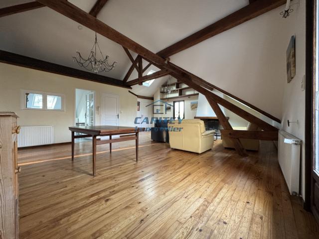 Appartement d'environ 74 m2 habitable et 121m2 au sol, avec Cave, Parking privatif et Vue sur l'Étang des Forg