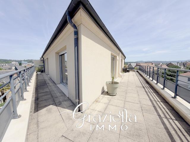 Appartement dernier étage avec terrasse panoramique au cœur de la ville