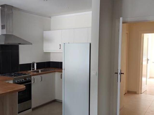 Appartement deux chambres avec jardin et garage