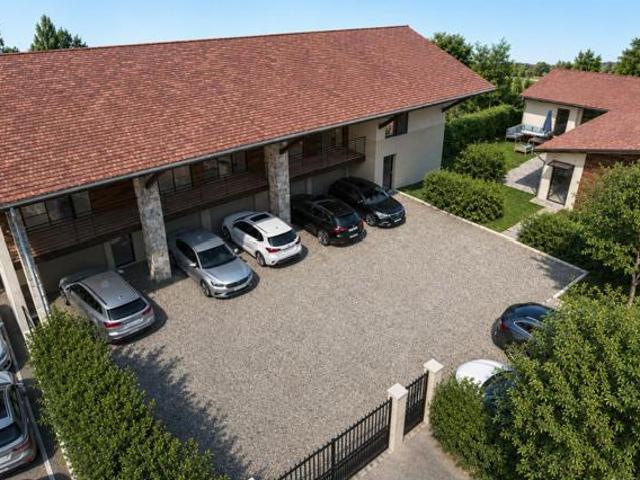 Appartement Duplex 2 Chambres 2 Places de parking Jardin Au cœur du village Proche commodités