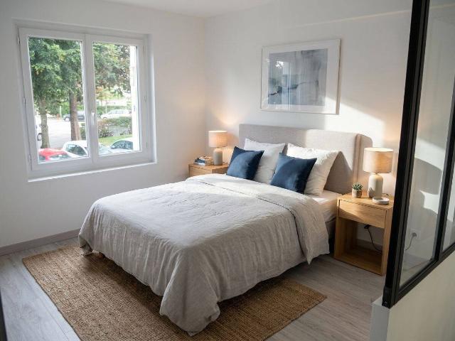 Appartement duplex lumineux avec jardin dans résidence arborée, pres des commerces, ecoles et transport en commun