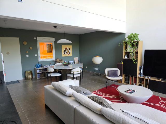 Appartement en duplex avec terrasse et parkings privatives