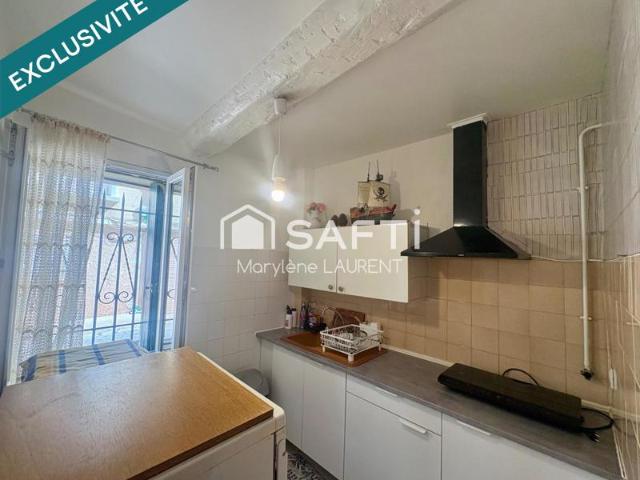 Appartement en rdc 1 chambre avec extérieur