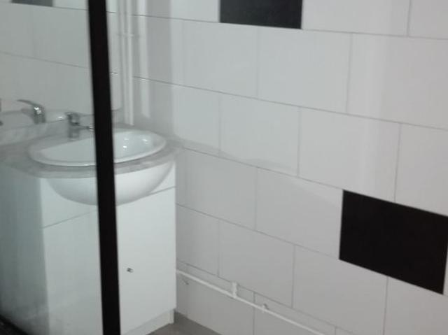 Appartement en résidence en RDC surélevé