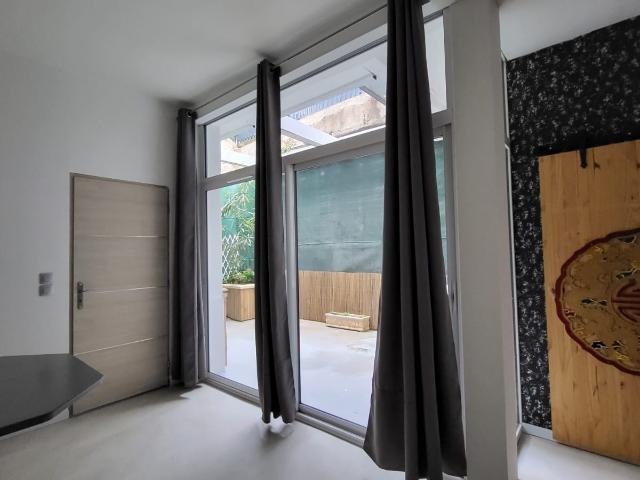 APPARTEMENT EN REZ DE CHAUSSEE