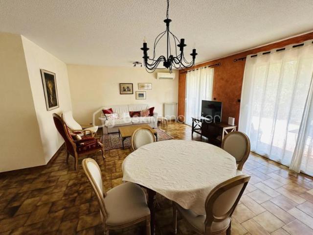 Appartement en rez de jardin avec garage + place de parking privative