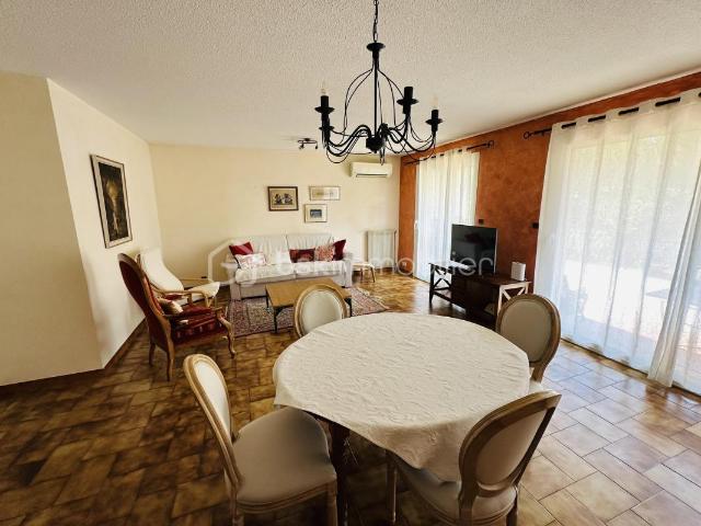 Appartement en rez de jardin avec garage + place de parking privative