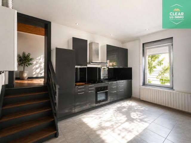 Appartement F2 55 m2 RDC avec cave et cuisine équipée