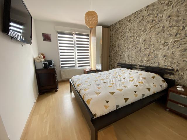 Appartement F2 avec terrasse, ascenseur, cave et parking
