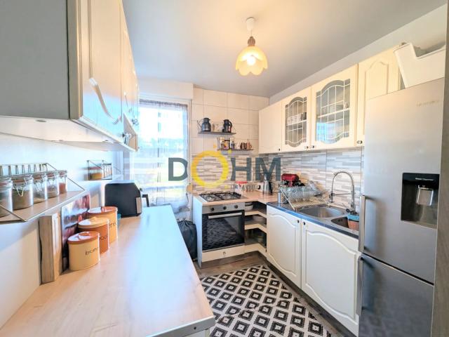 Appartement F4 avec balcon et box individuel