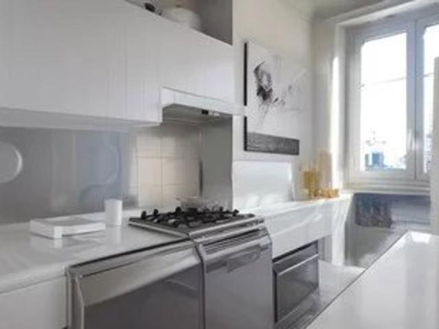 Appartement haussmannien 3 pièces / 2 chambres Investissement locatif