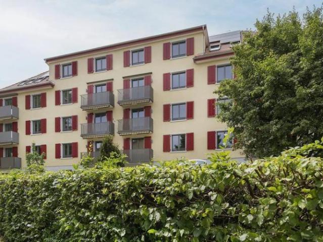 Appartement mansardé moderne avec caractère de quartier