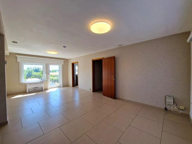 Appartement met 3 slpkmrs, tuin en garage nabij het station