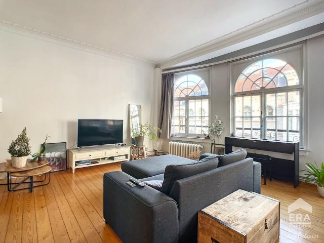 Appartement met 1 slaapkamer en bureau te huur in Schaerbeek