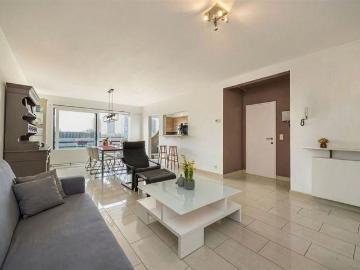 Appartement met 2 terrassen en garagebox in doodlopende straat