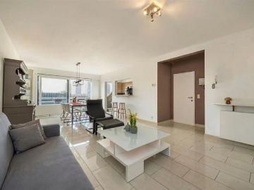 Appartement met 2 terrassen en garagebox in doodlopende straat