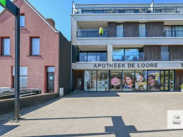 Appartement met 2 slaapkamers, terras en garagebox in het c