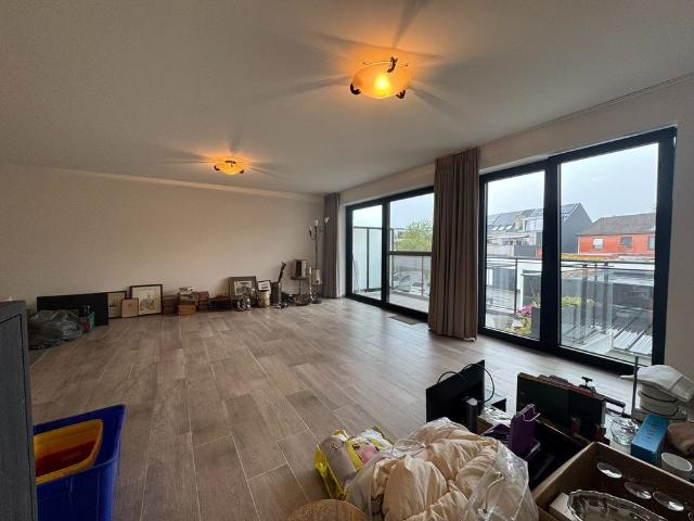 Appartement met 2 slaapkamers, terras en gesloten garagebox