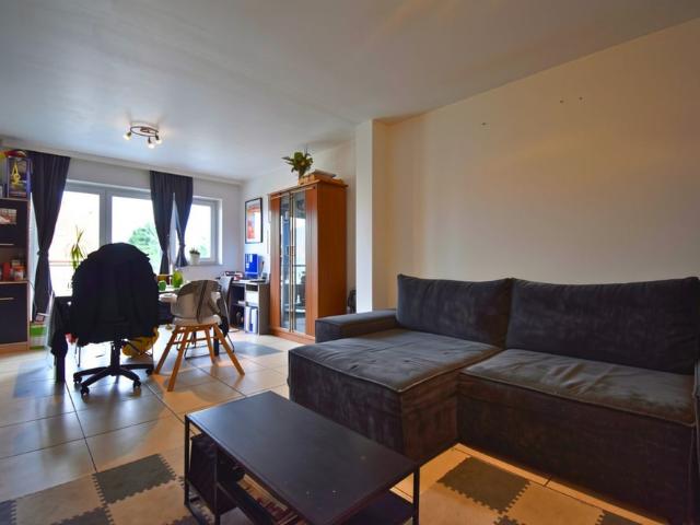 Appartement met 2 slaapkamers, garage en gemeenschappelijke tuin te huur in Sint Pieters Leeuw