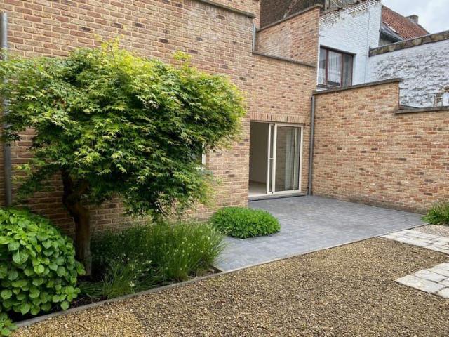 Appartement met tuin en garage te huur