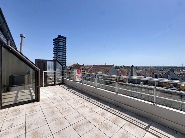 Appartement met zonnig en ruim terras te huur in Heist