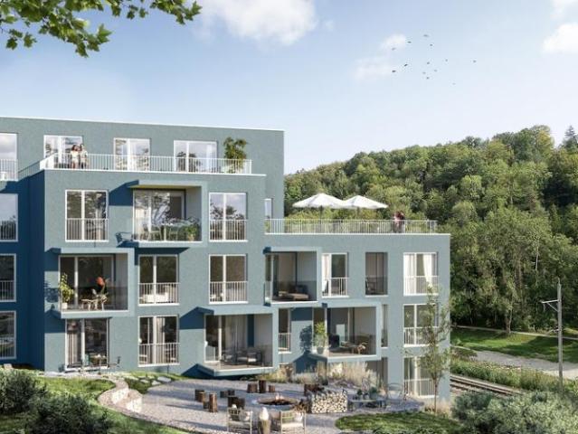 Appartement moderne de 3,5 pièces avec terrasse généreuse et vue sur la verdure