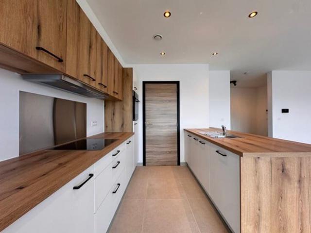 Appartement neuf de plain pied avec terrasse au centre de Li