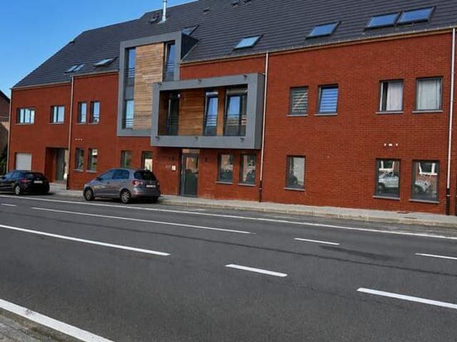 Appartement neuf RDC, 2 chambres, jardin, parking