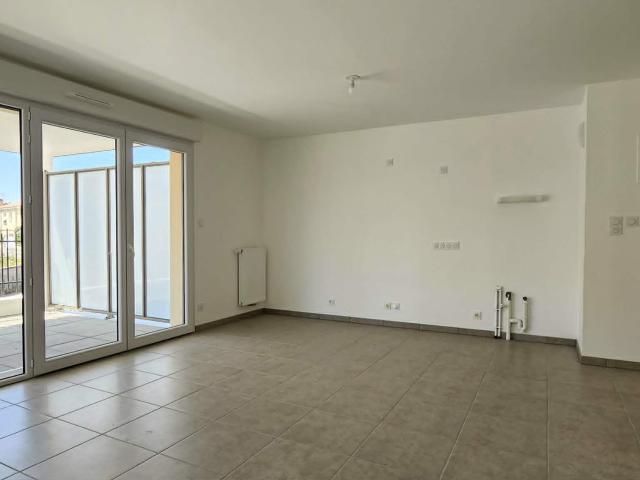 Appartement neuf 2 chambres avec jardinet en centre ville