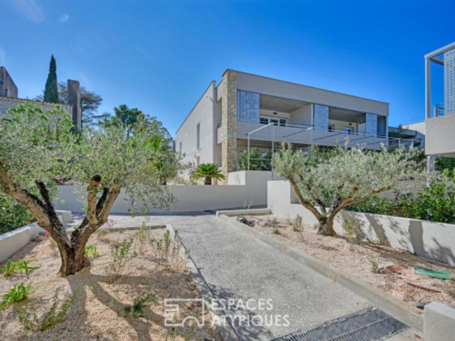 Appartement P4 avec terrasse, jardin, garages et ascenseur quartier Camplanier