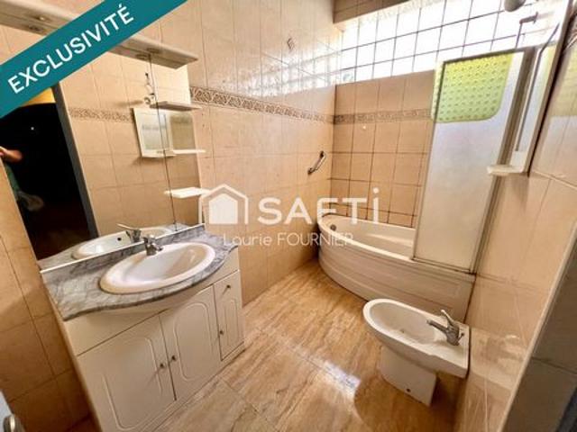 Appartement RDC T3 80 m² avec garage à rénover