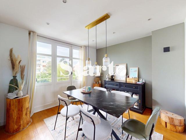 Appartement rénové avec balcon et garage proche centre