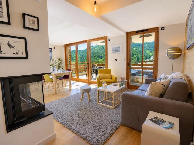Appartement récent avec chambre et coin nuit près des remont. 63m² Châtel
