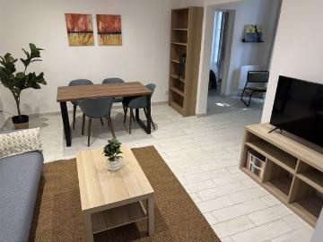 Appartement rez de chaussée avec terrasse, cave et cellier