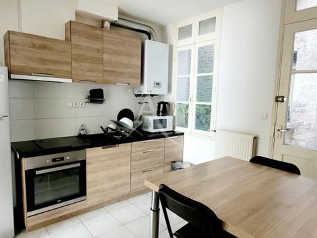 Appartement Saintes et local commercial 78m²